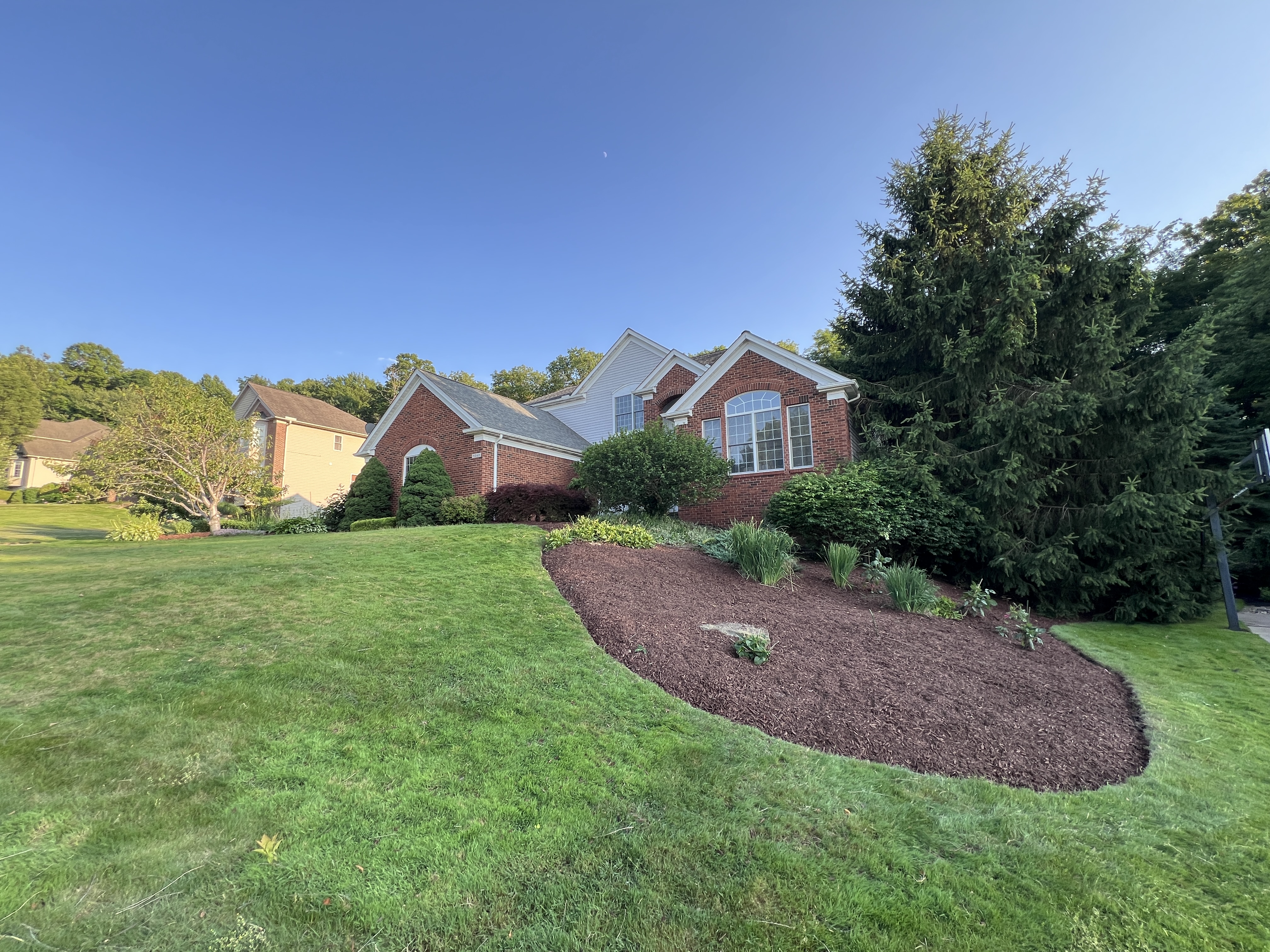Real maintained property landscape by Three Brothers Landscaping